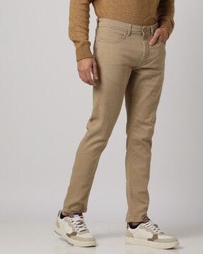 mid-rise slim tapered fit jeans