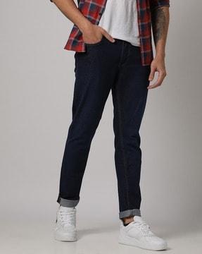 mid-rise slim tapered fit jeans