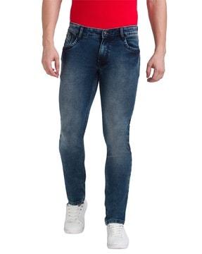 mid-rise slim tapered jeans