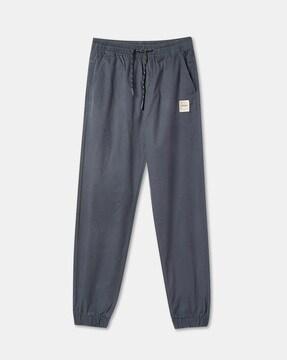mid-rise straight track pants with drawstring waist