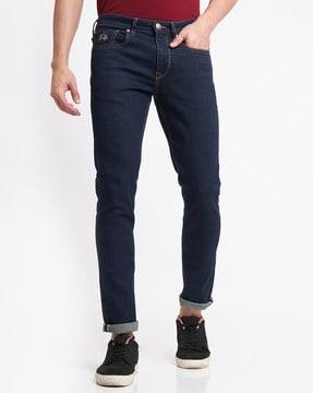 mid-rise tapered fit jeans