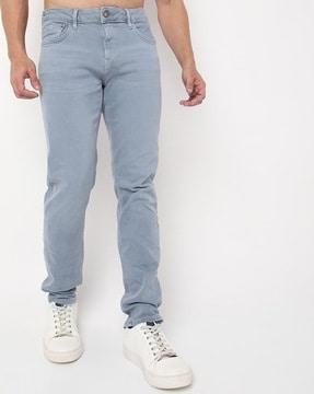 mid-rise tapered fit jeans