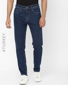 mid-rise tapered fit jeans