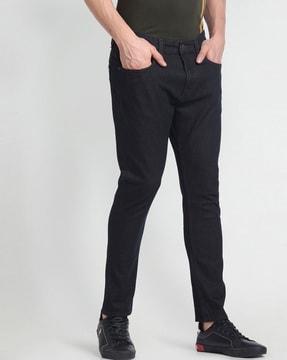 mid-rise tapered fit jeans