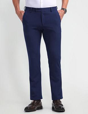 mid rise tapered fit trousers