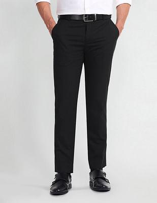 mid rise tapered fit trousers