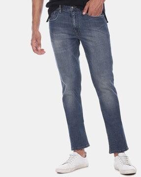 mid-rise tapered jeans with 5-pocket styling