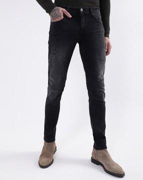 mid-rise tapered jeans