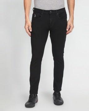 mid-rise tapered jeans