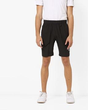 mid-rise tennis shorts with insert pockets