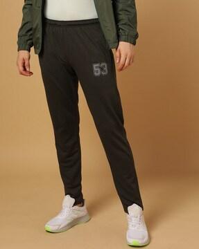 mid-rise track pants with insert pockets