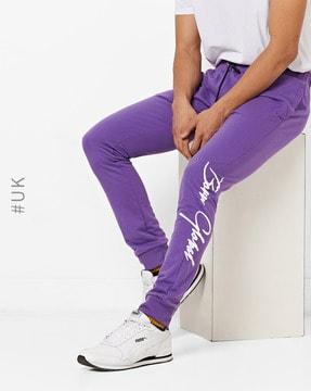 mid-rise track pants with placement typography