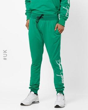 mid-rise track pants with placement typography