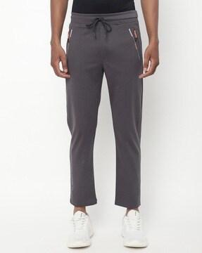 mid-rise track pants with zip pockets