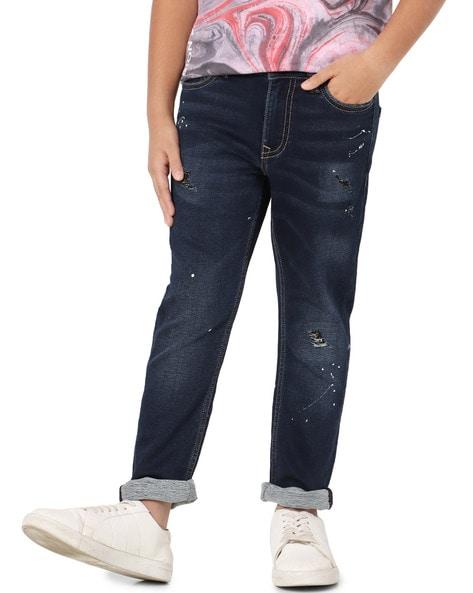 mid-wash distressed jeans