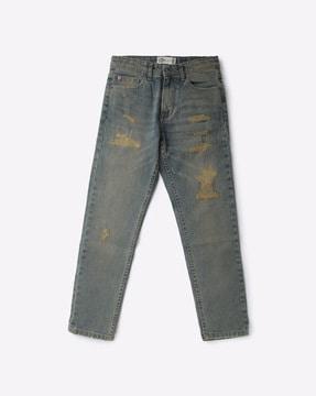 mid-wash distressed slim fit jeans