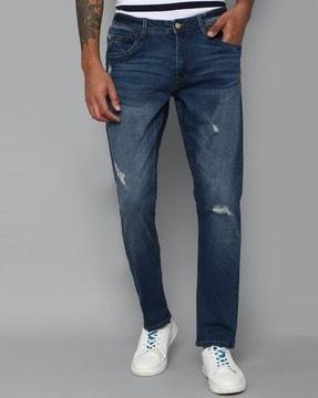 mid-wash distressed slim fit jeans