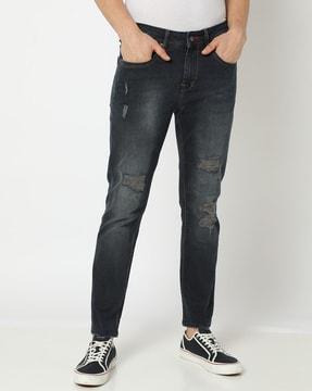 mid-wash-distressed-slim-tapered-jeans