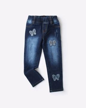 mid-wash jeggings with embroidered applique