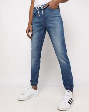 mid-wash jogger jeans