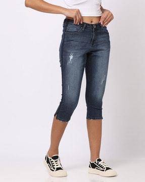 mid-wash lightly distressed slim fit capri jeans