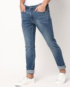 mid-wash skinny fit jeans