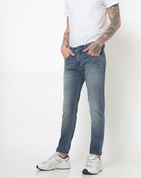 mid-wash slim fit jeans with whiskers