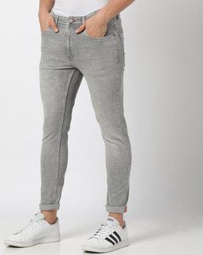 mid-wash slim tapered jeans