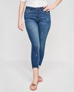 mid-wash distressed skinny fit jeans