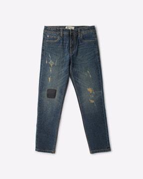 mid-wash distressed slim fit jeans