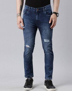 mid-wash distressed slim fit jeans