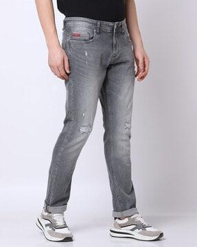 mid-wash distressed straight fit jeans