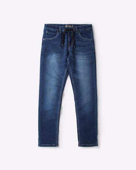 mid-wash drawstring slim jeans