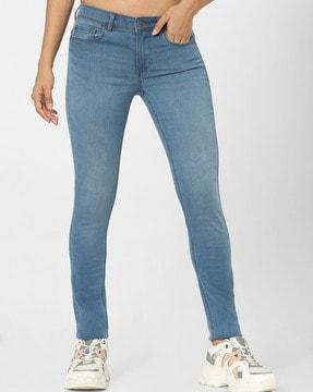 mid-wash high-rise skinny jeans