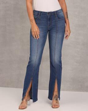 mid-wash jeans with ankle slits