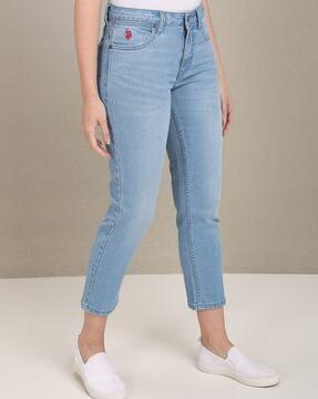 mid-wash jeans with belt loops