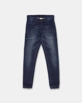 mid-wash jeans with button closure