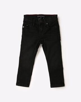 mid-wash jeans with button closure