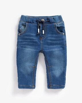 mid-wash jeans with drawcord waist