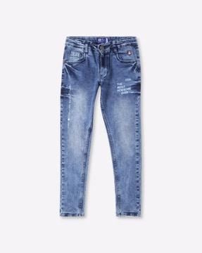 mid-wash jeans with typographic print