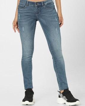 mid-wash low-rise skinny jeans