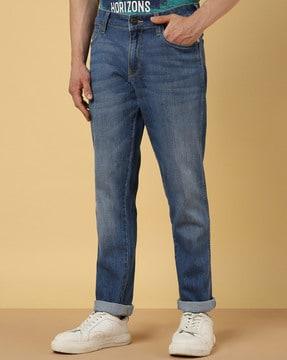 mid-wash low-rise slim fit jeans