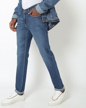 mid-wash mid-rise skinny jeans
