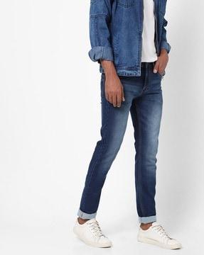 mid-wash mid-rise skinny jeans