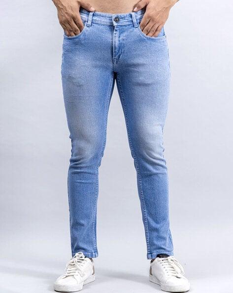 mid-wash mid-rise skinny jeans