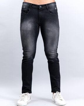 mid-wash mid-rise skinny jeans
