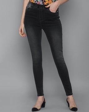 mid-wash mid-rise skinny jeans