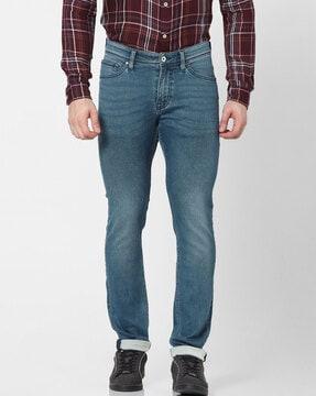 mid-wash mid-rise slim jeans