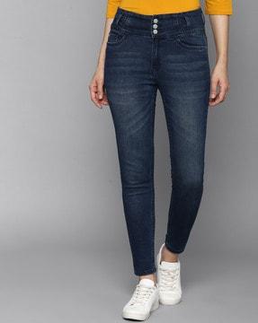 mid-wash skinny fit jeans with whiskers