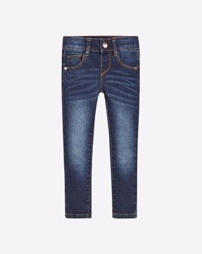 mid-wash skinny fit jeans with whiskers